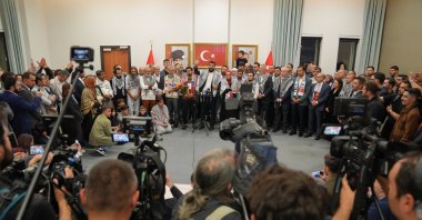 Sumud Flotilla activists speak to reporters at Istanbul Airport, Oct. 7, 2025. (AA Photo)