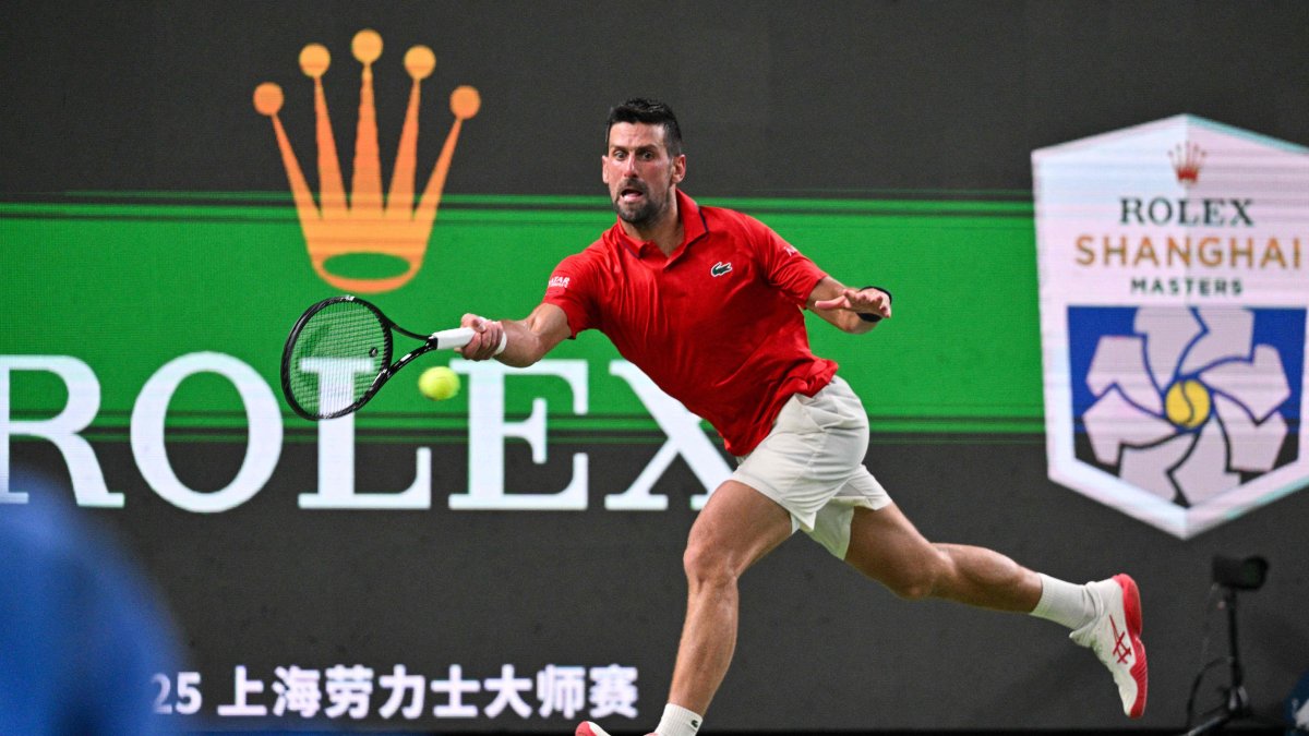 Serbia&#039;s Novak Djokovic hits a return to Spain&#039;s Jaume Munar during their men&#039;s singles match at the Shanghai Masters tennis tournament, Shanghai, China, Oct. 7, 2025. (AFP Photo)