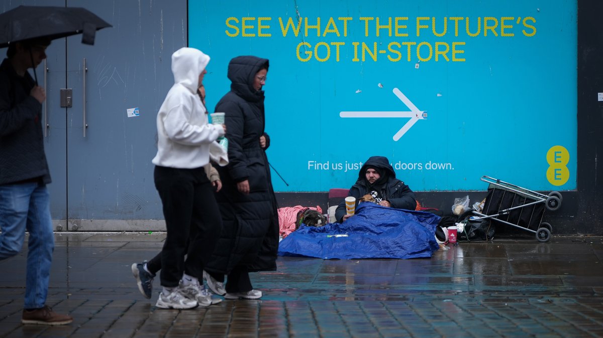 A homeless person begs for small change in Manchester, U.K., Sept. 1, 2025. (Getty Images)