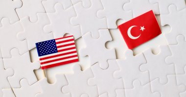 U.S. and Türkiye flags are seen in this stock photo. (Shutterstock Photo)