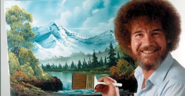 This undated image shows artist Bob Ross, host of the series “The Joy of Painting.” (AP Photo)