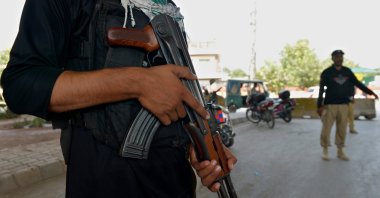 Pakistani security officials stand guard at a checkpoint, as security has been intensified, in Peshawar, Khyber Pakhtunkhwa province, Pakistan, Sept. 22, 2025. (EPA Photo)