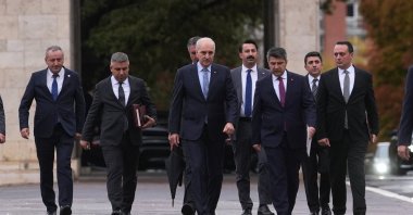 Parliament Speaker Numan Kurtulmuş (C) arrives for the meeting of the committee he chairs, Ankara, Türkiye, Oct. 8, 2025. (AA Photo)