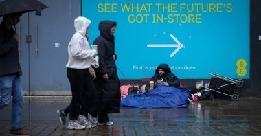 A homeless person begs for small change in Manchester, U.K., Sept. 1, 2025. (Getty Images)