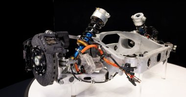 A view of the suspension and brake system as the new electric technology developed for Ferrari&#039;s first electric car, including chassis, battery modules and electric motor, is unveiled at the company’s headquarters in Maranello, Italy, Oct. 8, 2025. (Reuters Photo)