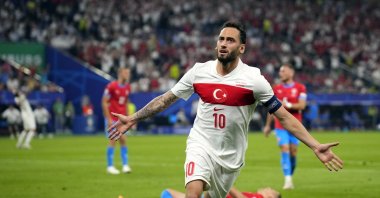 Türkiye&#039;s Hakan Çalhanoğlu celebrates after scoring the opening goal during a Group F match against Czechia at the Euro 2024, Hamburg, Germany, June 26, 2024. (AP Photo)