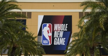 An NBA logo is displayed outside a basketball arena, Lake Buena Vista, U.S., Aug. 28, 2020.  (AP Photo)