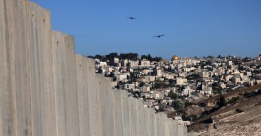 The Dome of the Rock Mosque and surrounding buildings are pictured from the Palestinian city of Abu Dis in the occupied West Bank, with Israel&#039;s West Bank separation barrier in the foreground, Oct. 7, 2025. (EPA Photo)