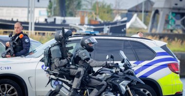 Tight security measures by police forces are in place during the visit by U.S. Secretary of Homeland Security Kristi Noem and Belgian Prime Minister Bart De Wever (unseen) to the Port of Antwerp in Antwerp, Belgium, Sept. 10, 2025. (EPA File Photo)