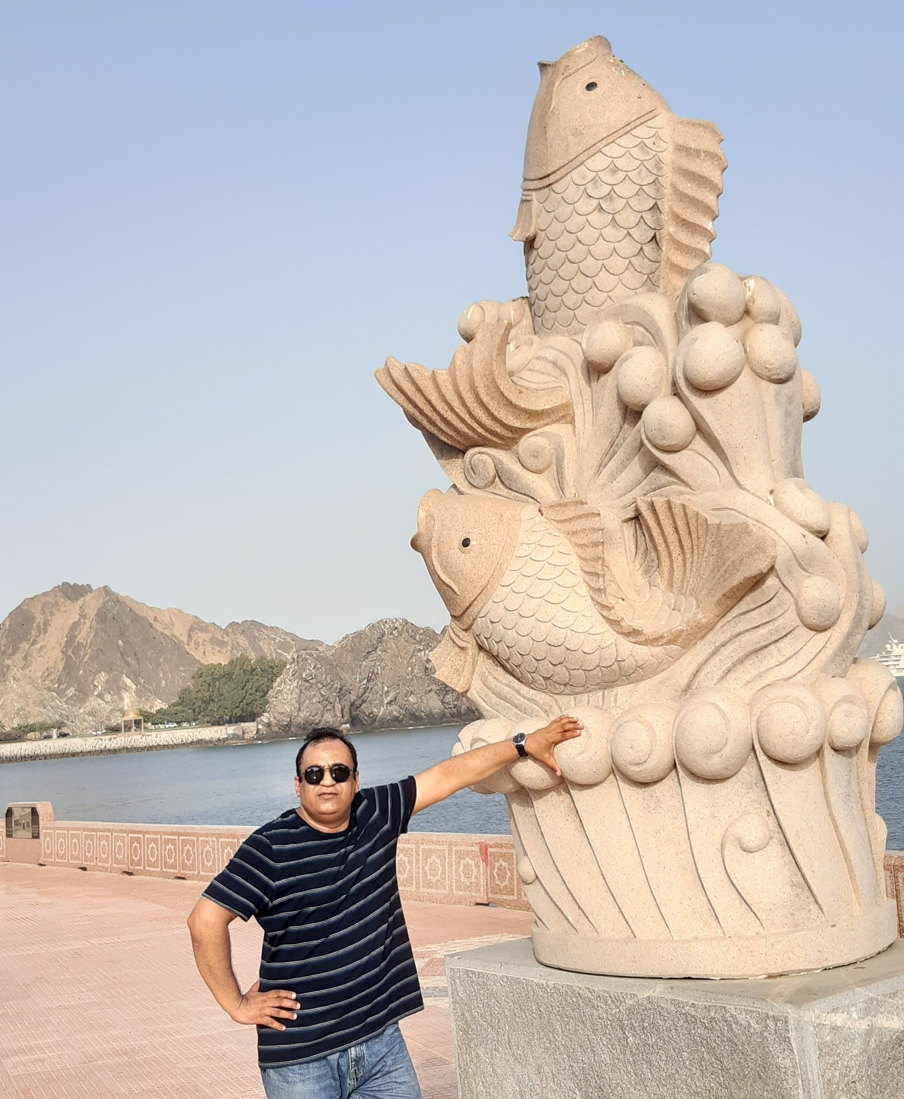 Irfan Raja poses with a sculpture, Muscat, Oman, July 18, 2025. (Photo by Irfan Raja)