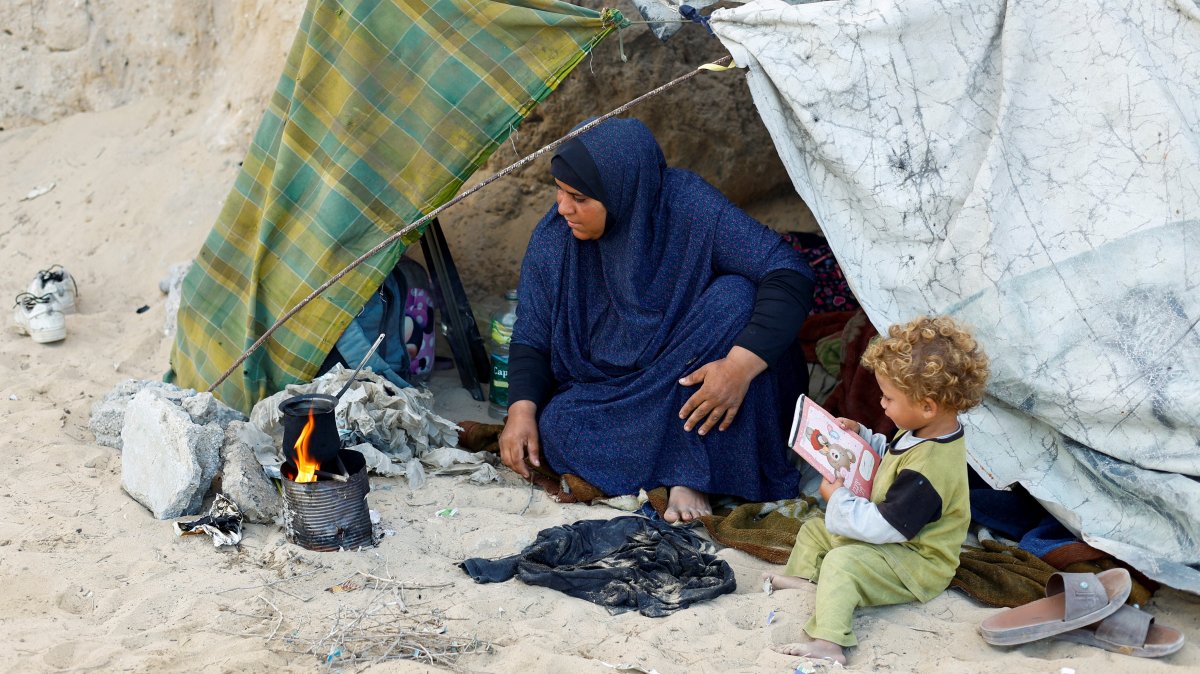 Displaced Palestinians take shelter inside their tents, after Israel’s government ratified a cease-fire with Hamas, central Gaza Strip, Palestine, Oct.10, 2025. (Reuters Photo)