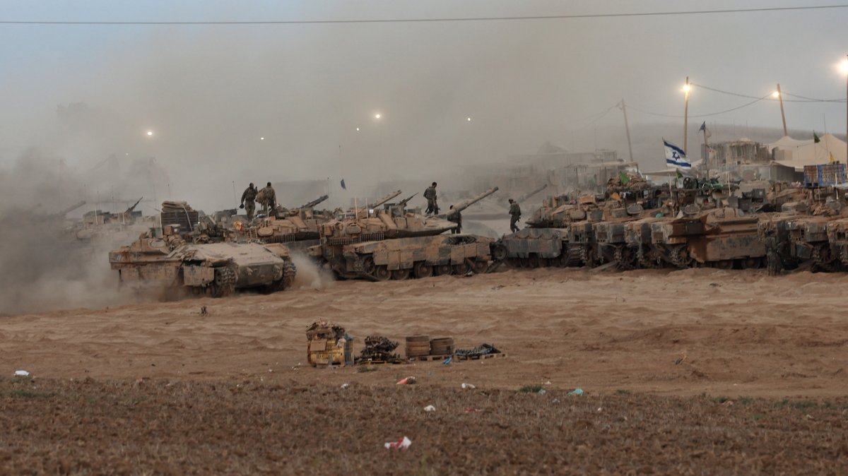 Israeli tanks arrive at a gathering site after withdrawing from the Gaza Strip following the cease-fire, near the Israeli-Gaza border, southern Israel, Oct. 10, 2025. (EPA Photo)
