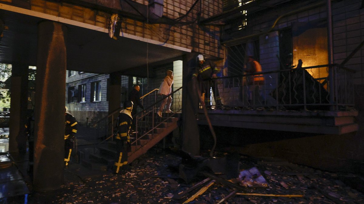 Ukrainian rescuers work at the site of a Russian strike on a residential building amid the ongoing Russian invasion, Kyiv, Ukraine, Oct. 10, 2025. (EPA Photo)