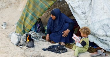 Displaced Palestinians take shelter inside their tents, after Israel’s government ratified a cease-fire with Hamas, central Gaza Strip, Palestine, Oct.10, 2025. (Reuters Photo)