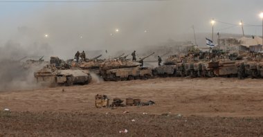 Israeli tanks arrive at a gathering site after withdrawing from the Gaza Strip following the cease-fire, near the Israeli-Gaza border, southern Israel, Oct. 10, 2025. (EPA Photo)