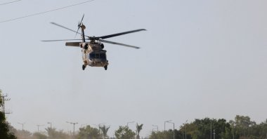 An Israeli black hawk helicopter departs from Reim military base, where the Israeli hostages are expected to arrive after their release, amid a ceasefire between Israel and Hamas in Gaza, in southern Israel, Oct. 11, 2025. (Reuters Photo)