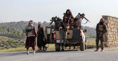 Taliban security personnel arrive to patrol along a road in the Zazai Maidan district of Khost province near the Afghanistan-Pakistan border Oct. 12, 2025. (AFP Photo)