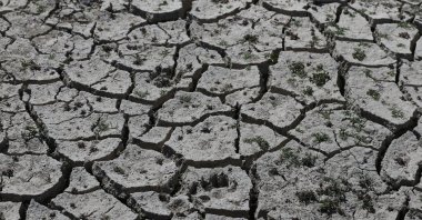 A dried and cracked landscape at Bahçelik Dam, showing a 60% drop in water levels, Kayseri, Türkiye, Oct. 10, 2025. (AA Photo)