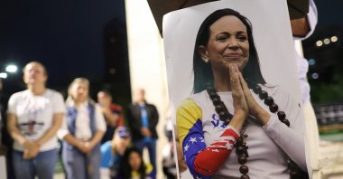A photo of Maria Corina Machado is displayed as Venezuelans residing in Argentina celebrate her winning the Nobel Peace Prize, in Buenos Aires, Argentina, Oct. 11, 2025. (Reuters Photo)