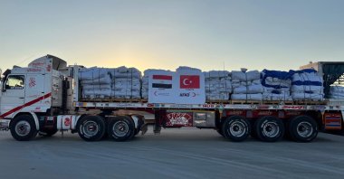 A humanitarian aid truck from Türkiye’s Disaster and Emergency Management Presidency (AFAD) awaits before proceeding towards the Rafah border crossing, between Egypt and the Gaza Strip, in Rafah, North Sinai, Egypt, Oct. 12, 2025. (AA Photo)