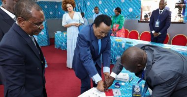 Cameroon President Paul Biya (C) casts his vote during the presidential election in Yaounde, Cameroon, Oct. 12, 2025. (EPA Photo)