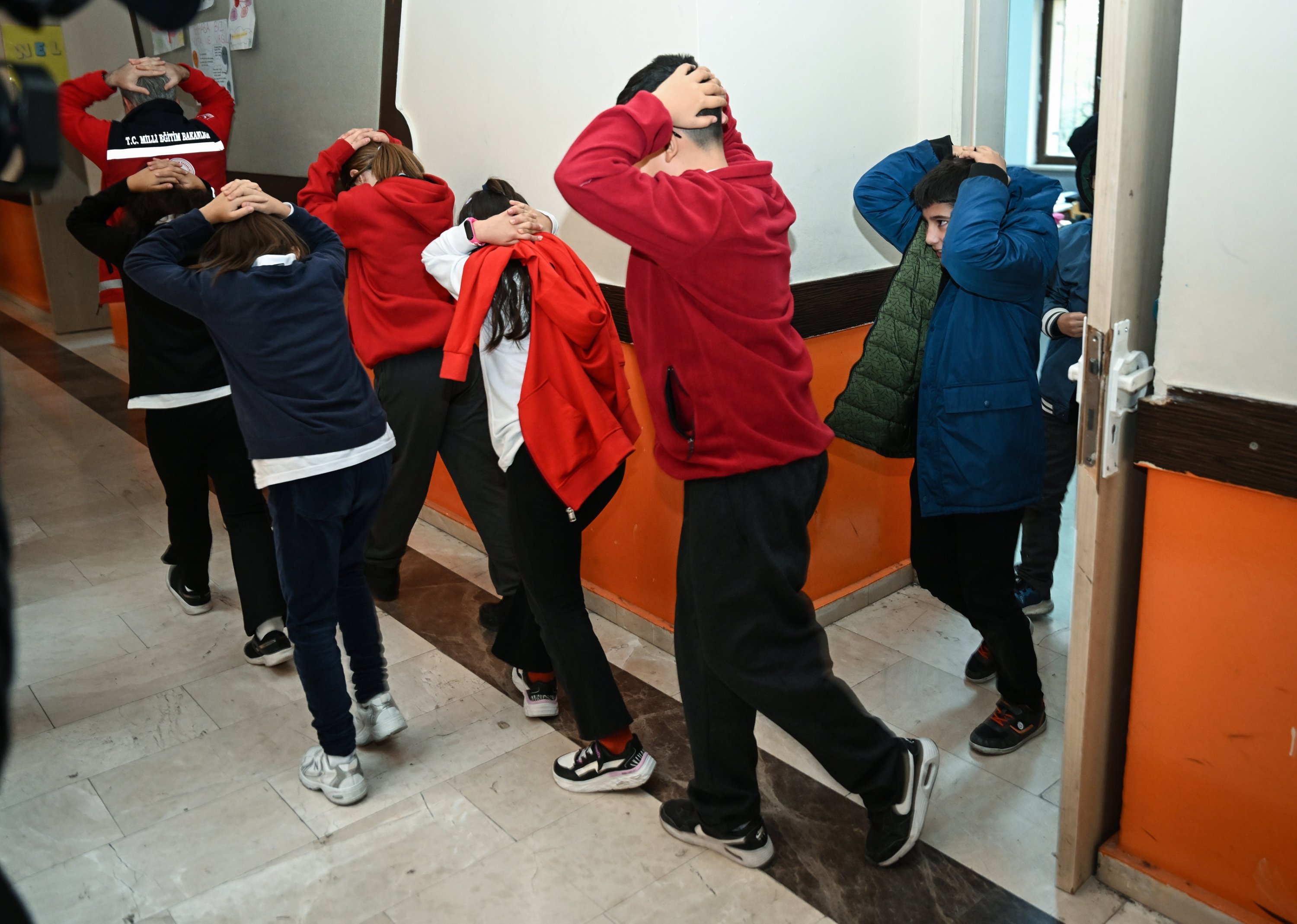 Students participate in a disaster awareness training and earthquake evacuation drill at Haydar Aliyev Middle School, Ankara, Türkiye, Oct. 13, 2025. (AA Photo)