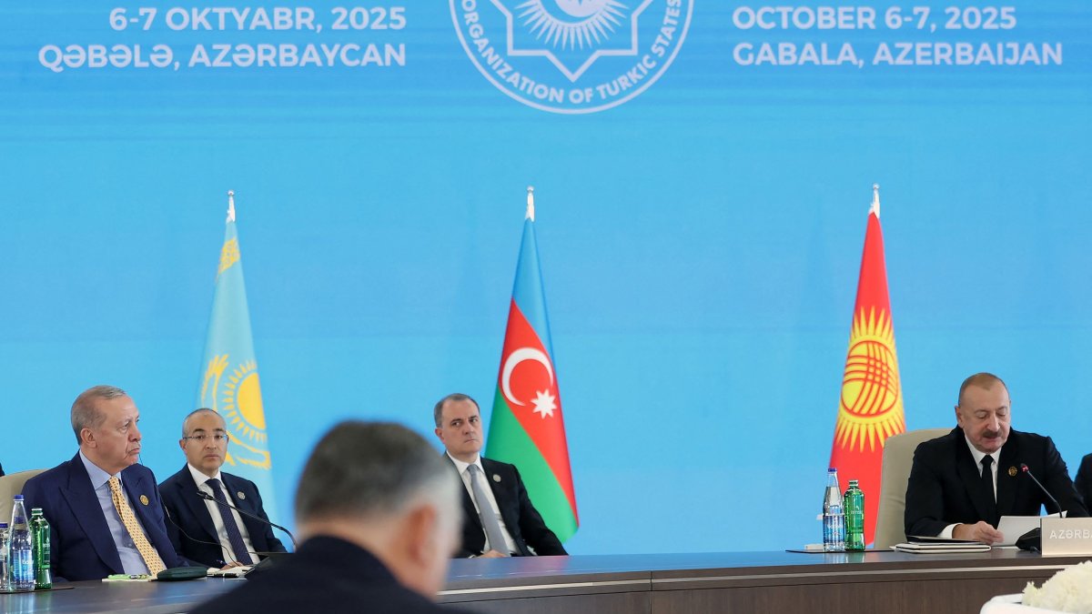 Azerbaijan&#039;s President Ilham Aliyev (R) speaks next to President Recep Tayyip Erdogan (L) during a session of the 12th Summit of the Organization of Turkic States (OTS), Gabala, Azerbaijan, Oct. 7, 2025. (AFP Photo)