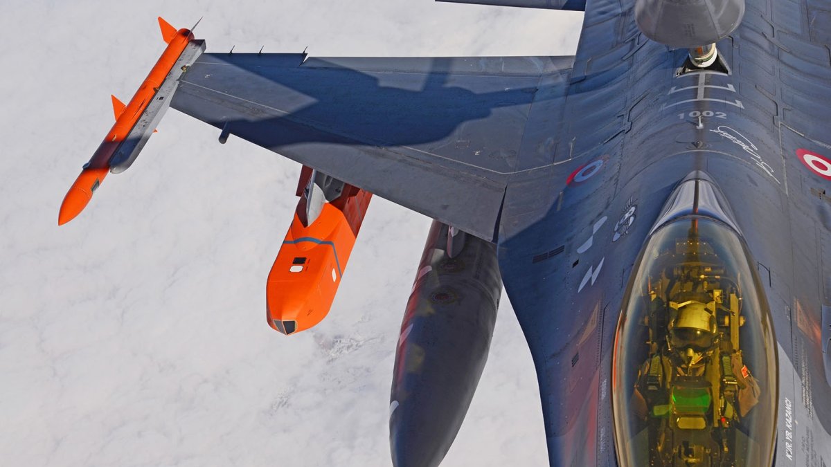 This file photo shows a fighter jet equipped with a SOM cruise missile (C). (Courtesy of TUBITAK SAGE)