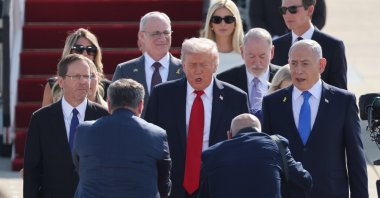 Israeli President Isaac Herzog (L), US President Donald Trump (C), and Israeli Prime Minister Benjamin Netanyahu at Ben Gurion Airport in Tel Aviv, Israel, Oct. 13, 2025. (EPA Photo)