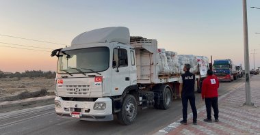 Disaster and Emergency Management Authority (AFAD) trucks carrying aid await before proceeding toward the Rafah border crossing, between Egypt and the Gaza Strip, Rafah, North Sinai, Egypt, Oct. 12, 2025. (AA Photo)