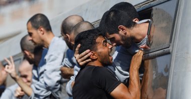 A man greets a freed Palestinian prisoner released by Israel as part of a hostage-prisoner swap, in Khan Younis, southern Gaza Strip, Palestine, Oct. 13, 2025. (Reuters Photo)