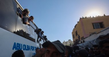 A bus carrying Palestinians released from Israeli prisons under a Gaza cease-fire and hostage exchange deal with Palestinian factions, arrives outside the Nasser Hospital in Khan Younis in the southern Gaza Strip, Oct. 13, 2025. (AFP Photo)