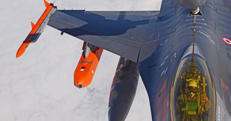 This file photo shows a fighter jet equipped with a SOM cruise missile (C). (Courtesy of TUBITAK SAGE)