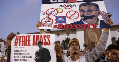 Demonstrators lift placards during a youth-led protest demanding reforms to public health care and education at Mohamed V Square, Casablanca, Morocco, Oct. 6, 2025. (Photo AFP)