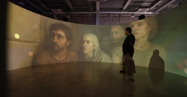 Visitors explore the newly opened visitor center at Arslantepe Mound, Malatya, eastern Türkiye, Oct. 6, 2025. (AA Photo)