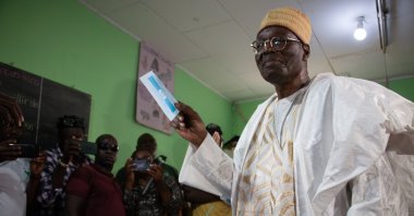 Presidential candidate Issa Tchiroma Bakary, leader of the Cameroon National Salvation Front and former employment minister, prepares to cast his vote in Garoua, Cameroon, Oct. 12, 2025. (EPA Photo)