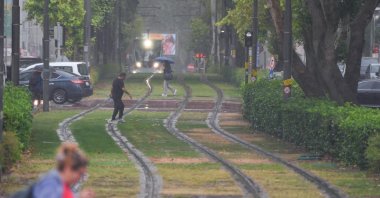 Rain falls on streets, ending 121 days of drought in Izmir, western Türkiye, Sept. 29, 2025. (AA Photo)
