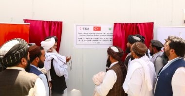 Farmers inspect produce at a newly opened 300-ton cold storage facility in Paktiya, Afghanistan, Oct. 14, 2025. (AA Photo)
