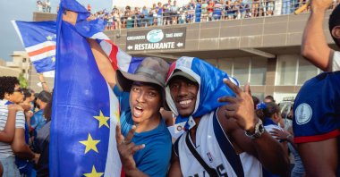 Supporters celebrate Cape Verde’s victory against Eswatini during the FIFA World Cup 2026 Africa qualifiers group D match at a fan zone, Sao Vicente, Cape Verde, Oct. 13, 2025. (AFP Photo)