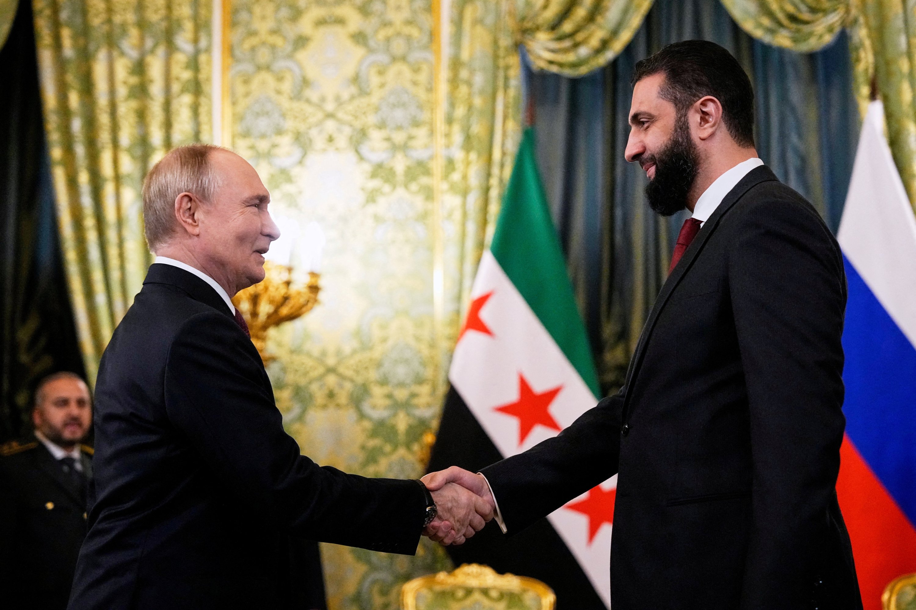 Syria's president vows to respect past agreements with Russia