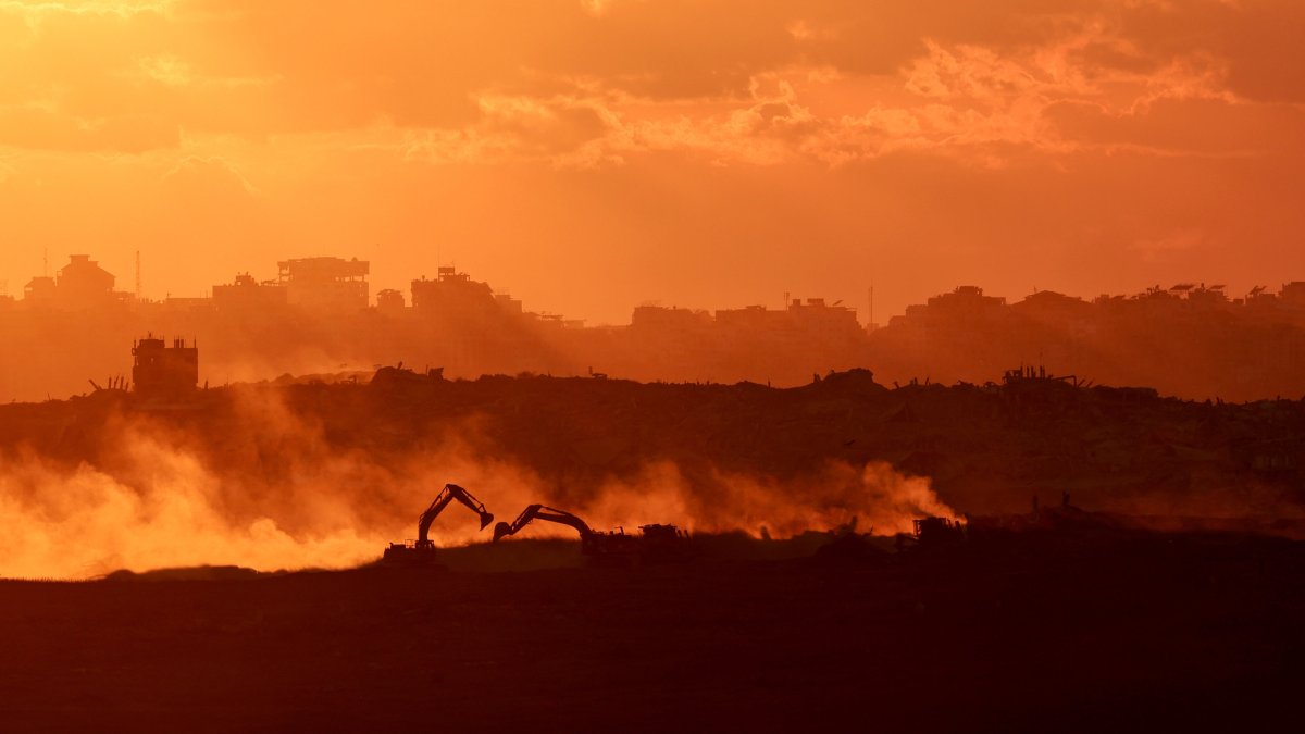 Dust rises as Israeli troops move in the northern part of the Gaza Strip, Palestine, as seen from the Israeli side of the border, following the Israel-Hamas agreement, Oct. 14, 2025. (EPA Photo)