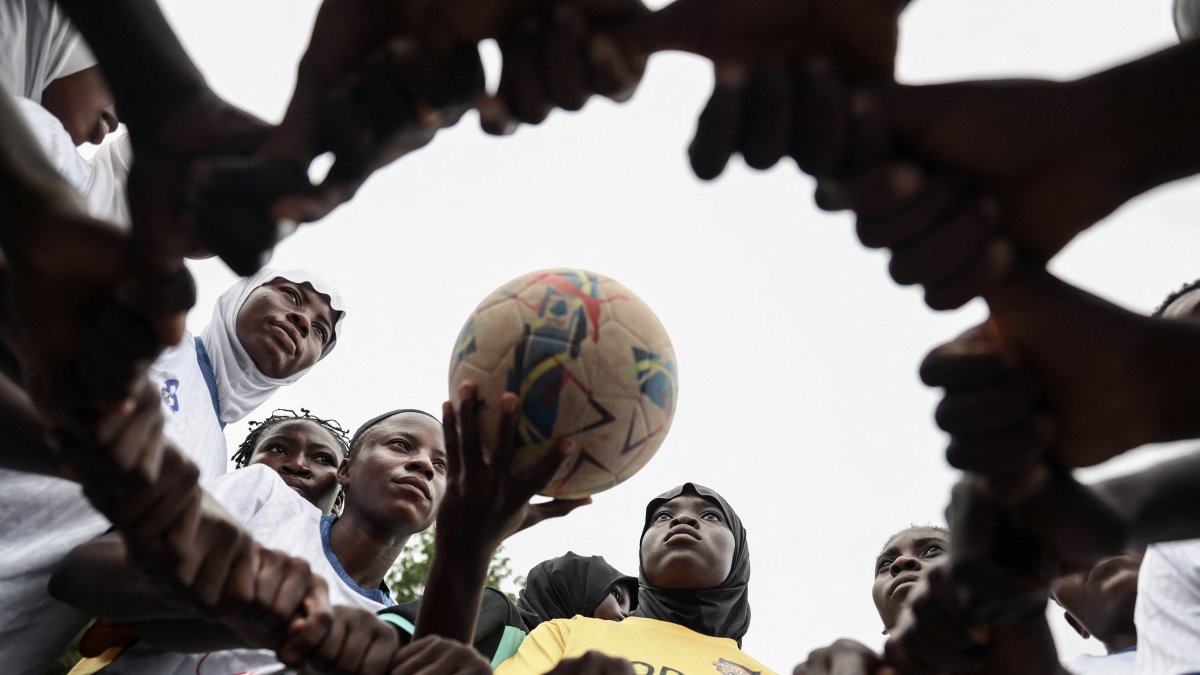 Model Queens Football Academy team players prepare for the Youth Tournament final match with Kwara Ladies FC, Ilorin, Kwara State, Nigeria, Aug. 29, 2025. (Reuters Photo)