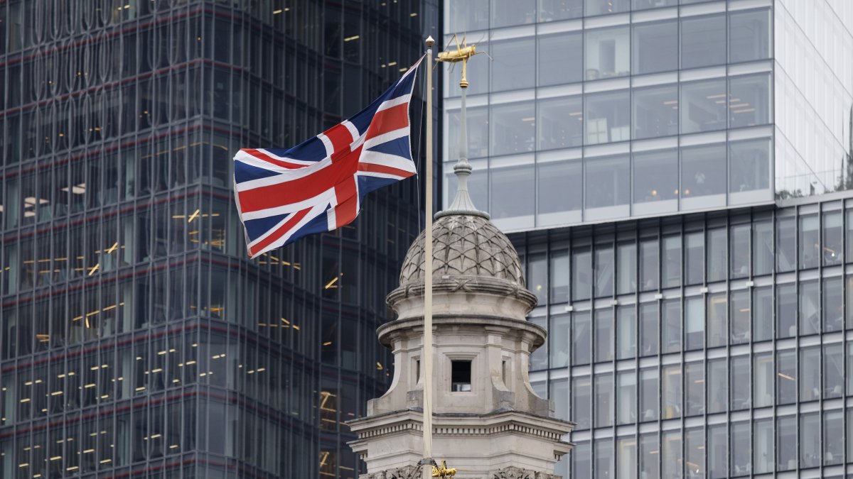 The U.K. flag flies at the City of London financial district, London, U.K., Sept. 18, 2025. (EPA Photo)