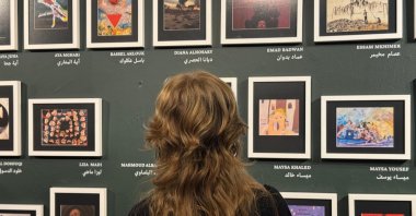 A visitor explores the Gaza Biennale, Istanbul, Türkiye, Sept. 24, 2025. (AA Photo)