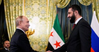 Russia&#039;s President Vladimir Putin shakes hands with Syria&#039;s President Ahmed al-Sharaa during a meeting at the Kremlin in Moscow, Russia, Oct.15, 2025. (Reuters Photo)