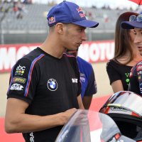 Türkiye’s Toprak Razgatlıoğlu (L) supports compatriot Can Öncü of Yamaha Blu Cru Evan Bros Team ahead of the second race of the 2025 World Superbike Championship’s 10th round at Motorland Aragon, Spain, Sept. 28, 2025. (AA Photo)
