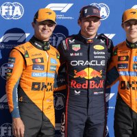 Red Bull driver Max Verstappen (C), celebrates his pole position with McLaren drivers Lando Norris (L) and Oscar Piastri after the qualifying session ahead of the Italian Grand Prix at the Monza racetrack, Monza, Italy, Sept. 6, 2025. (AP Photo)