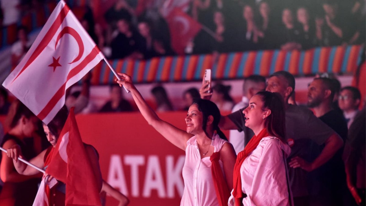 Supporters wave flags at the launch of TRNC President Ersin Tatar&#039;s “Vision: Offensive Diplomacy” campaign, Lefkoşa (Nicosia), TRNC, Sept. 24. (AA Photo)