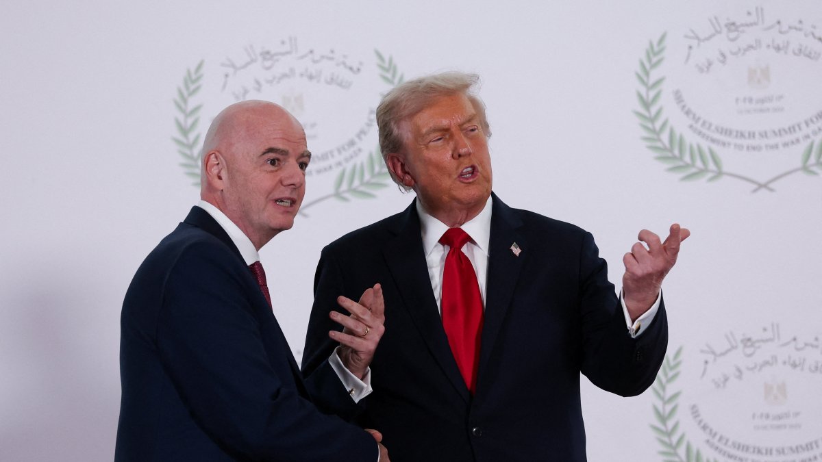U.S. President Donald Trump and FIFA president Gianni Infantino pose for a photo, at a world leaders&#039; summit on ending the Gaza war, Sharm el-Sheikh, Egypt, Oct. 13, 2025. (Reuters Photo)