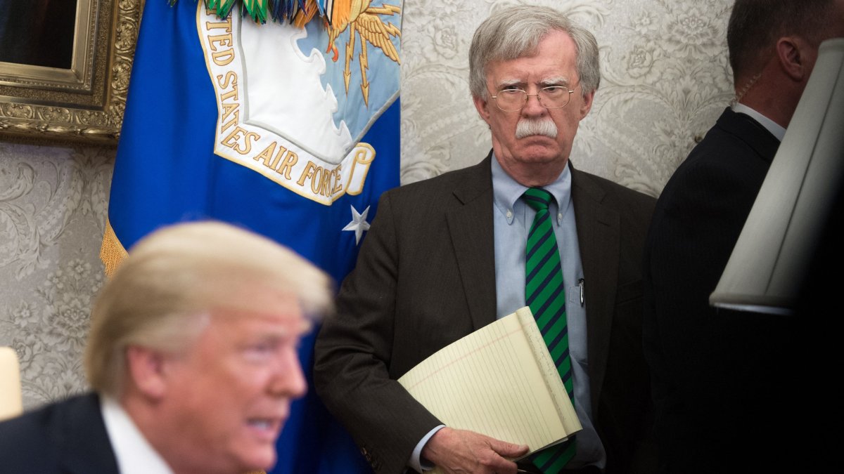 National Security Adviser John Bolton stands alongside U.S. President Donald Trump as he speaks during a meeting with NATO Secretary General Jens Stoltenberg in the Oval Office of the White House in Washington, D.C., May 17, 2018. (AFP File Photo)